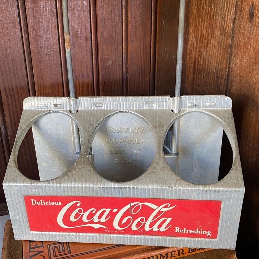 Collectors piece of Coke history. The patent number dates this to the 1950's.